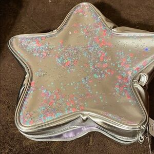 Claire’s Silver Metallic Star-Shaped Bag with Glitter Accents